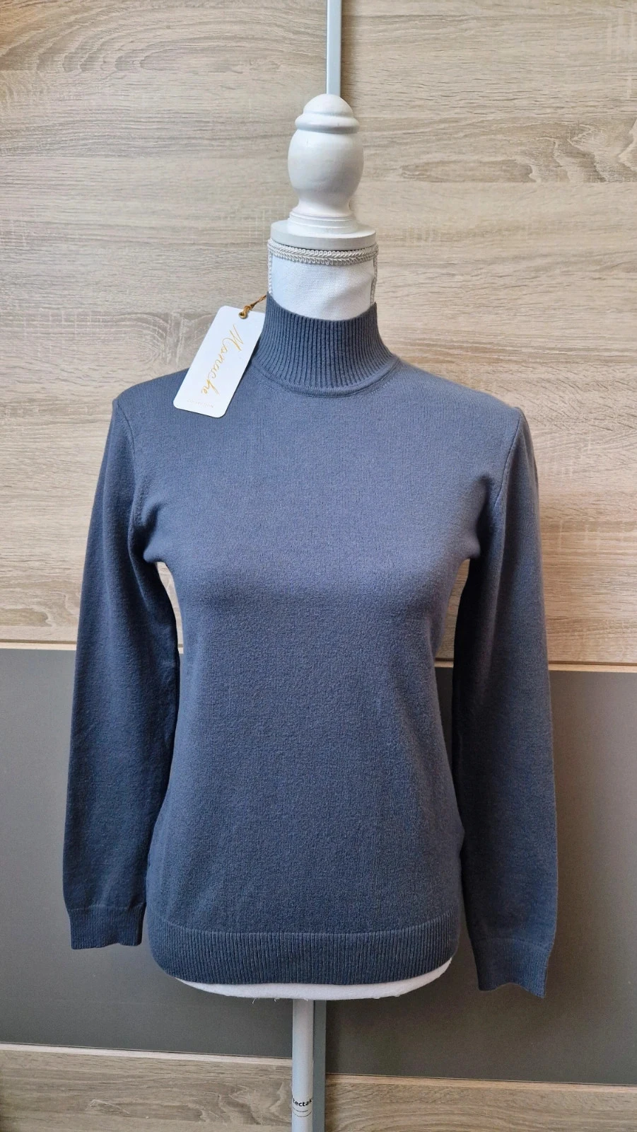 Pull col roulé